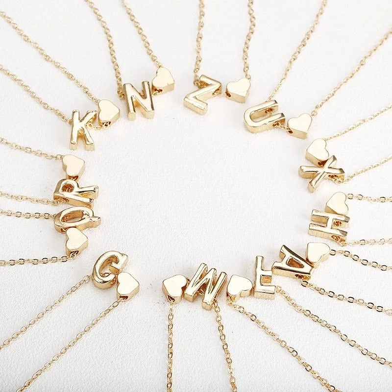 Riley Watson Jewellery Infinity Necklace. Gold B top page by Riley Watson | Riley Watson Jewellery